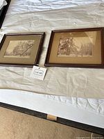 Front view showing both framed sepia landscape prints
