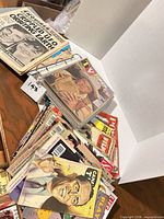 Overview of stacked magazines and binder