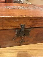 Front view showing latch and nailhead pattern