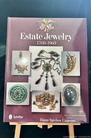 Front cover showing title, subtitle, sample jewelry images, author, and publisher logo