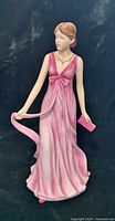 Front view of Royal Doulton Julia figurine showing full gown and accessories
