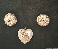 Lot overview showing pendant and both earrings