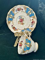 Cup and saucer displaying pattern and gilding