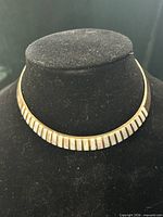 Necklace on display bust showing overall look and fit