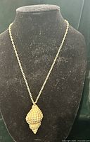 Full view of necklace on display bust