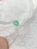Loose round emerald on white background