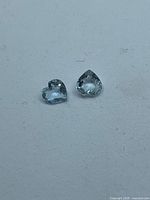 Pair of heart-cut aquamarines front view