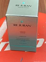 Front view of sealed Rejuran Turnover Ampoule box showing branding and volume