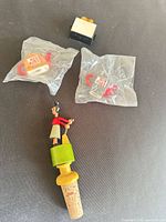 Overview of all items: bottle stopper, two sealed teapots, toaster