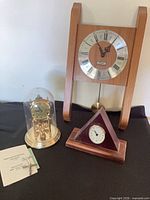 Group shot showing all three clocks
