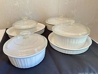 Full group of casseroles, bakers and lids