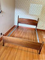 Full view of assembled wooden double bed frame