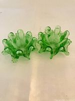 Pair of green art glass dishes side by side