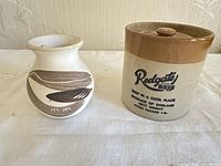 Jar and vase side by side showing scale, color and graphics