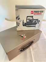 Slide viewer box and strong box with keys visible