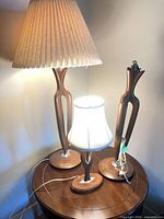 Group view of three lamps on round table