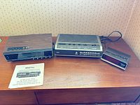 Overview of the three clock radios and manual