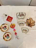 All seven items laid out on cloth background