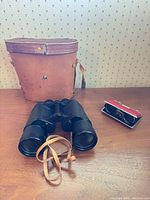 Binoculars with leather case and Pal-F opera glasses