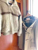 Banff wool zip jacket and Gloverall duffle coat hanging side by side