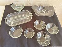 Group shot of all glass pieces on black cloth