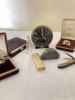 Group shot of all eight vintage items on table