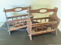 Both wooden magazine racks side by side