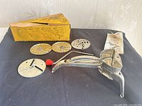Full lot showing shredder, four discs, box, instructions