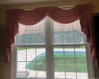 Full window view showing drapes, valance and rod