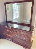 Front view of dresser with attached mirror