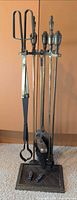 complete fireplace tool set assembled on stand