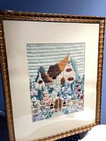 Full view of framed crewel embroidery piece