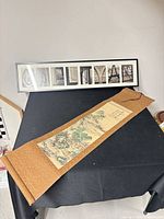 Frame and scroll displayed on table