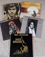 Front covers of five Neil Diamond albums