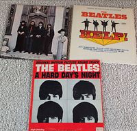 All three Beatles LP sleeves laid out: Hey Jude, Help!, A Hard Day’s Night