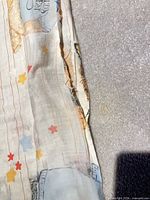 Close-up of frayed seam and fabric print