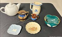 Group shot displaying all seven ceramic items