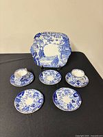 Full lot: cake plate, five saucers, two teacups