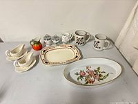 All twelve pieces laid out on table