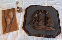 All three items: owl plaque, ship art, Norwegian figure