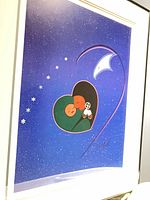 Oblique view of full framed print showing artwork, mat and frame