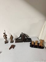 Full group shot: figurines, bookends, frog guiro, bears