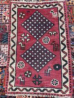 Full view of Shiraz rug showing overall design and colors