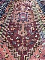 Closer view of central field and medallion, shows colors and wear