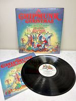 Front cover and vinyl record displayed