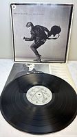 Front cover of LP and vinyl record displaying centre label