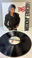 Front jacket of Michael Jackson Bad with vinyl record displayed