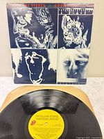 Front album cover and vinyl record