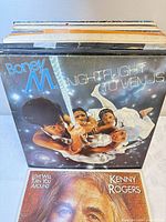 Stack of LP records showing Boney M album on top