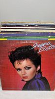 Stack of records with Sheena Easton album visible